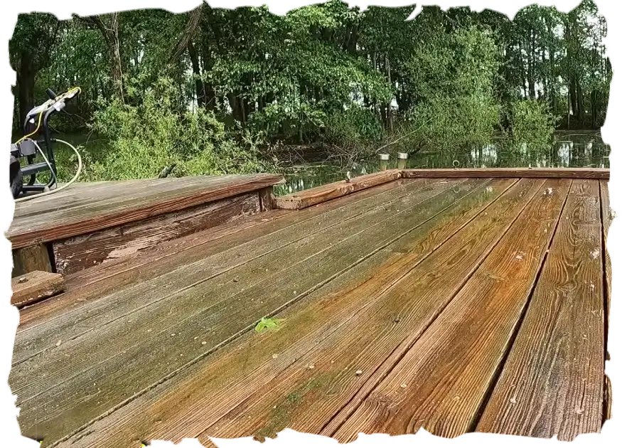 Pressure washing a wooden deck near regional park
